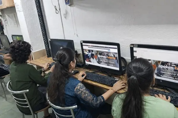 Children learning digital skills in a computer lab saksham
